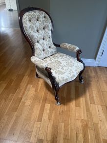Early Victorian salon/parlor chair in mint condition mahogany on castors.  Restored with original hair.  Beautiful piece of furniture