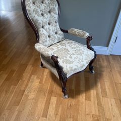 Early Victorian salon/parlor chair in mint condition mahogany on castors.  Restored with original hair.  Beautiful piece of furniture