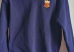 Sacred Heart School uniform jumper.