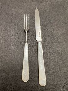 Antique A set of sterling silver and mother of pearl fruit knives and forks
