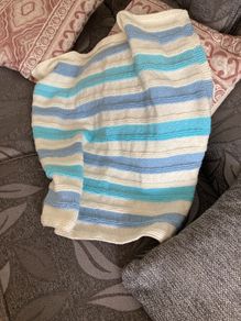 Cream turquoise and blue blanket