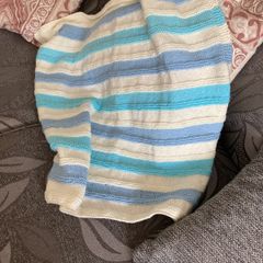 Cream turquoise and blue blanket