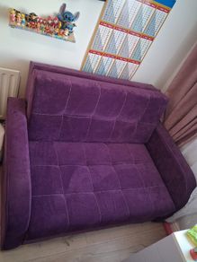 Purple fabric sofa bed