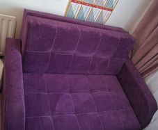 Purple fabric sofa bed