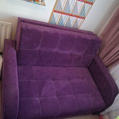 Purple fabric sofa bed