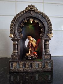 Lovely small Buddha ornament with changing colour light
