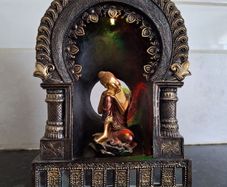 Lovely small Buddha ornament with changing colour light