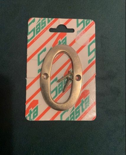Brand new polished brass door number