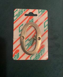 Brand new polished brass door number