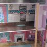 Large wooden dolls house with furniture Image 8