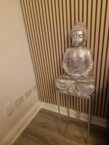 Large silver buddha and table