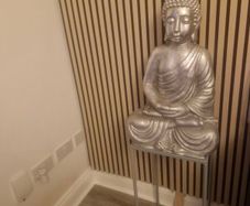 Large silver buddha and table