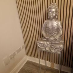 Large silver buddha and table