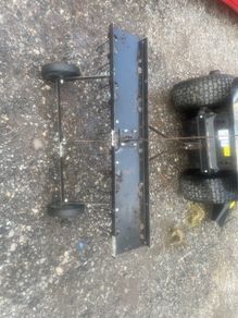 Lawn scarifier for ride on mower