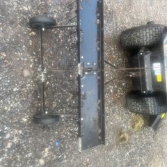 Lawn scarifier for ride on mower