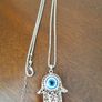 Hand with evil eye necklace and pendant Image 3