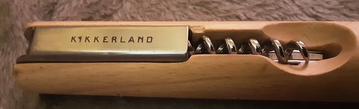 unusual bottle opener, approx a foot long