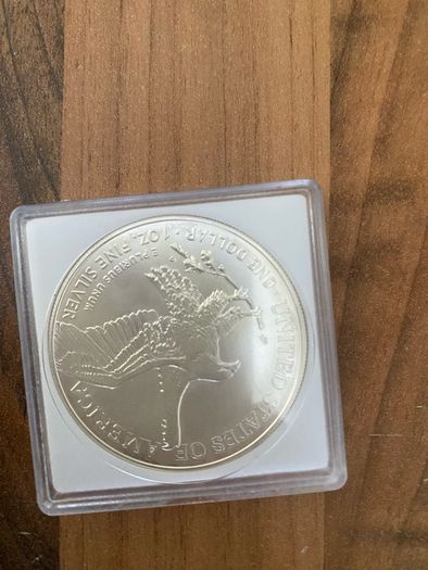 4 silver oz coins & 0.5g gold coin