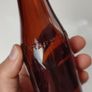 403 - Vintage T Kiely and Sons Tipperary Dark Amber Glass Collectible Decorative Bottle Image 4