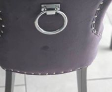 2 black velvet chairs