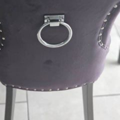 2 black velvet chairs