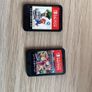 Nintendo Switch OLED (Neon Blue/Red) + Mario Kart 8 Deluxe + Super Mario Bros. W Image 4