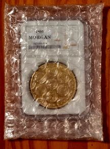 2PC  1894 Silvery + 1895 Golden 1 Dollar. New, unopened.