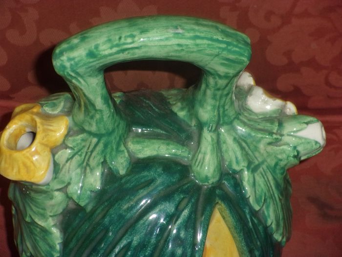 antiques majolia water jug in the shape of a mellan