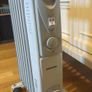 Daewoo 7-Fin 1500W Oil-Filled Radiator - Thermostat, Dual Heat Settings, Castors - Excellent Condition Image 4