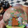 Jurassic Park gates snowglobe Image 7