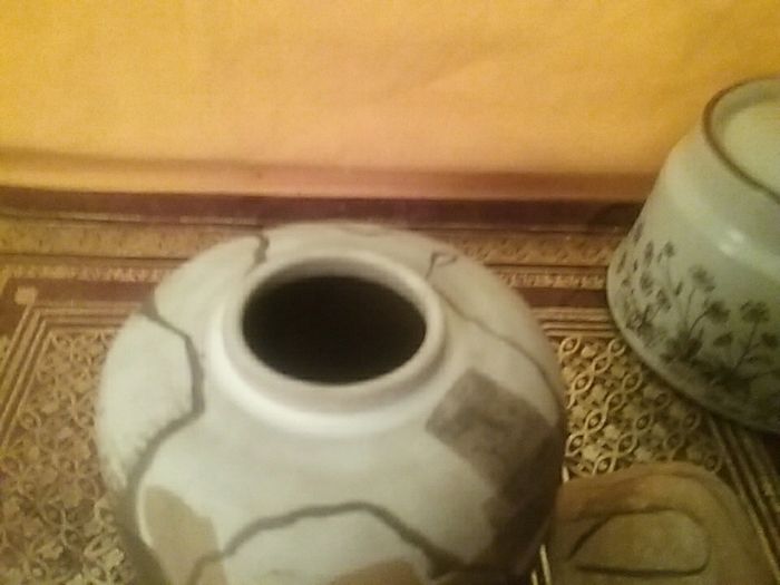 Two lidded Containers