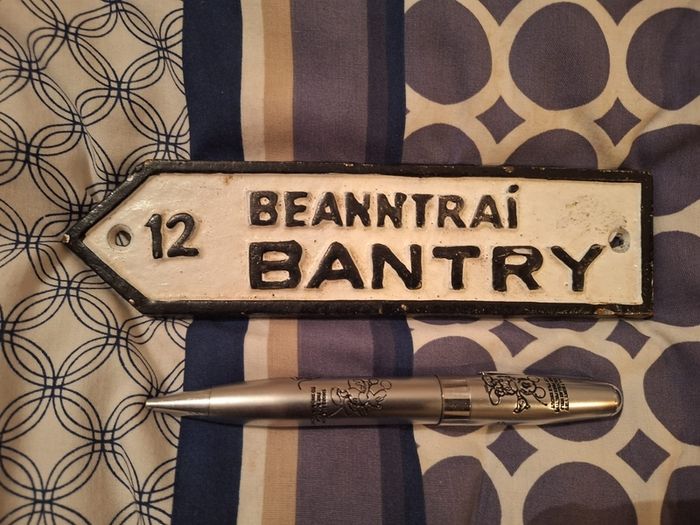 Small cast iron Bantry Road sign