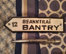 Small cast iron Bantry Road sign