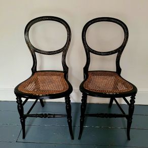 Antique pair of ebonised salon chairs with mother of pearl detail