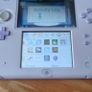 Boxed Lavender Nintendo 2DS Console. Image 5