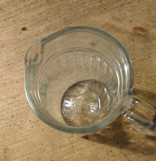 Luminarc glass pitcher with a ribbed design.