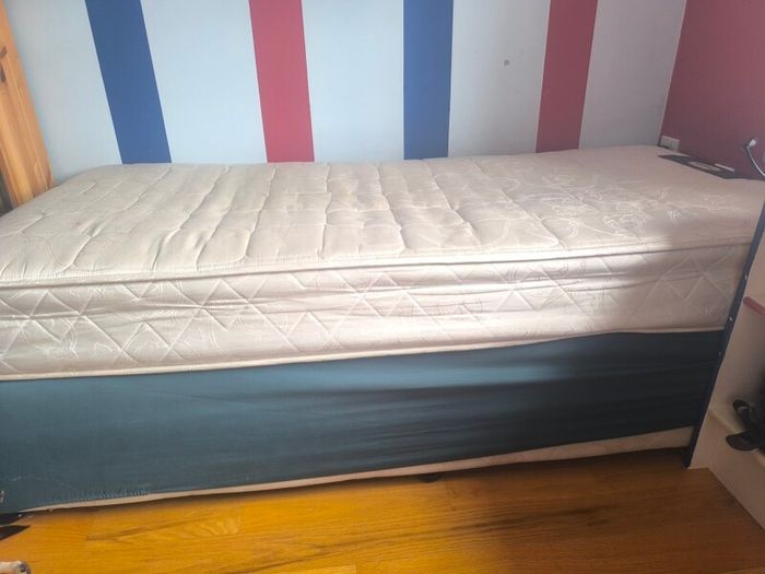 single bed with base