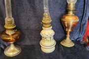 Three French oil lamps