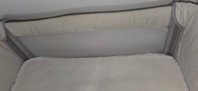 cot / next to me