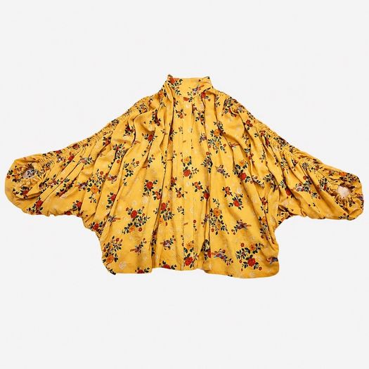 Artistic oversized floral blouse in a warm golden yellow tone