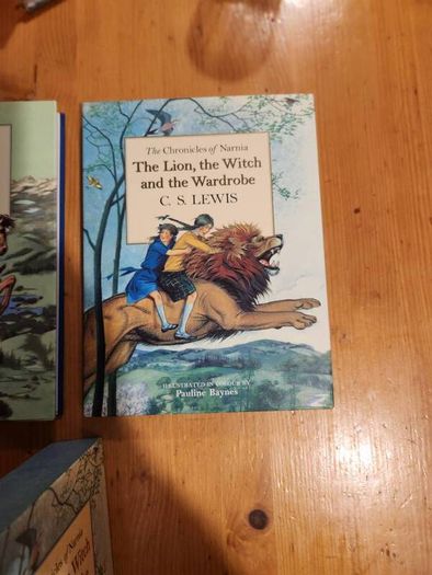The Chronicals Of Narnia Compilation.  2 Books In Presentation Folder. Large Volume Hardback In Very Good Condition.