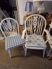 Two vintage white chairs