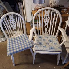 Two vintage white chairs