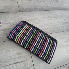 handmade clutch by Uganda's students