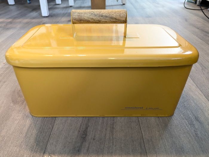 Mustard yellow 4 slice toaster and bread bin