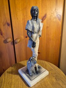 Vintage Sculpture of an Elegant Lady with a Dog