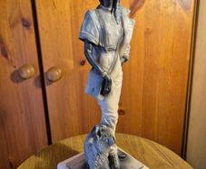 Vintage Sculpture of an Elegant Lady with a Dog