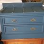 Chest drawers with brass strip suitcase set down Image 3
