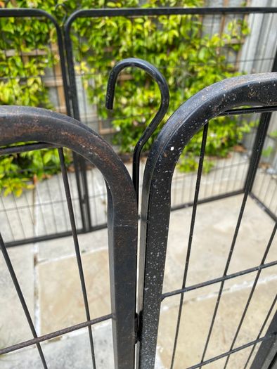 Black metal dog pen