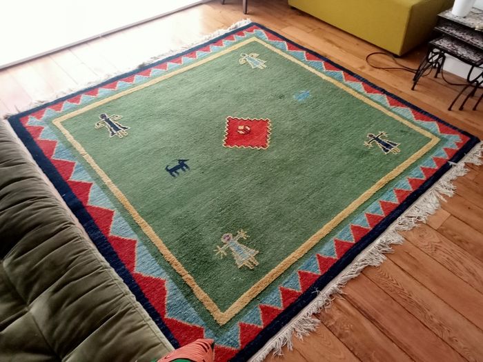 hand-knotted green Gabbeh rug